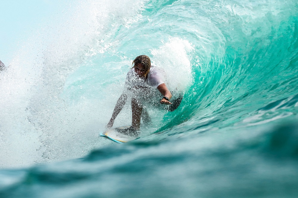 Surfer under a wave - Amazon video marketing