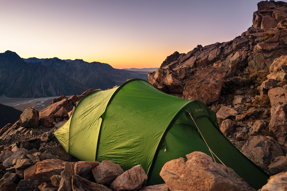 Green tent in mountains - Amazon video marketing