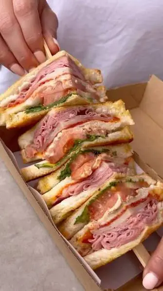 Before: Stacked sandwiches on board — professional food photography